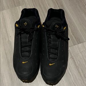 Like new.  Nike Hot Step Air Terra Drake NOCTA Black and Yellow Sneaker
